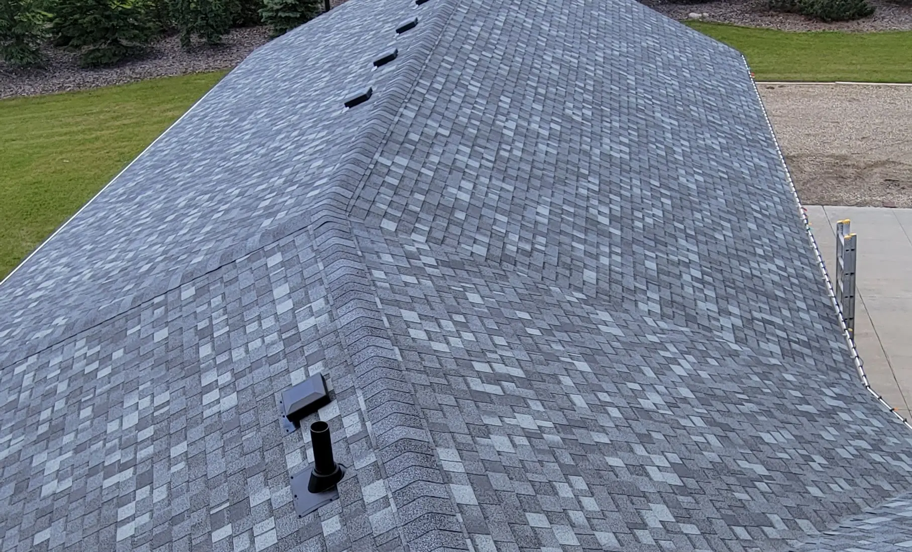 Asphalt shingle roof treated with rejuvenation near Dawson Creek