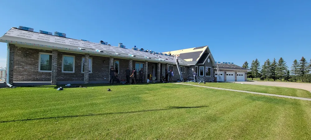 Long multi-unit roofing project completed by Raptor Mountain Roofing