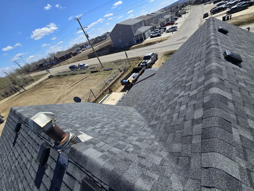 Shingle roof with new vents overlooking Dawson Creek